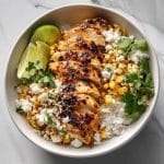Street corn chicken rice bowl with grilled chicken and creamy lime sauce